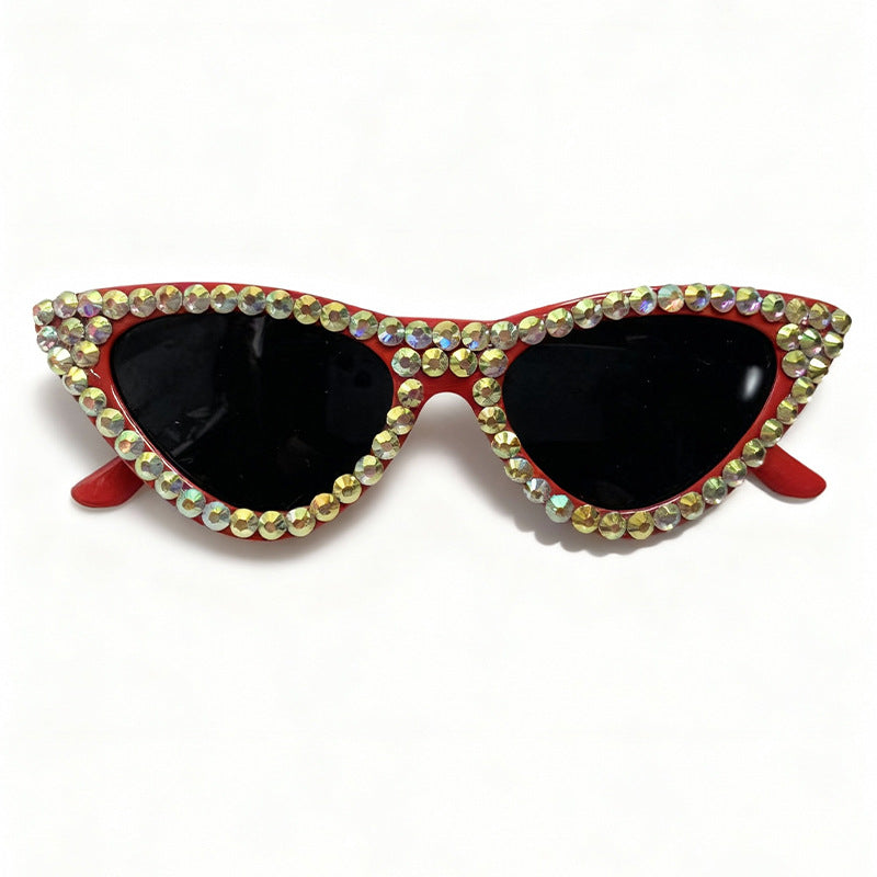 Glamorous rhinestone cat-eye sunglasses for women, offering essential UV protection.
