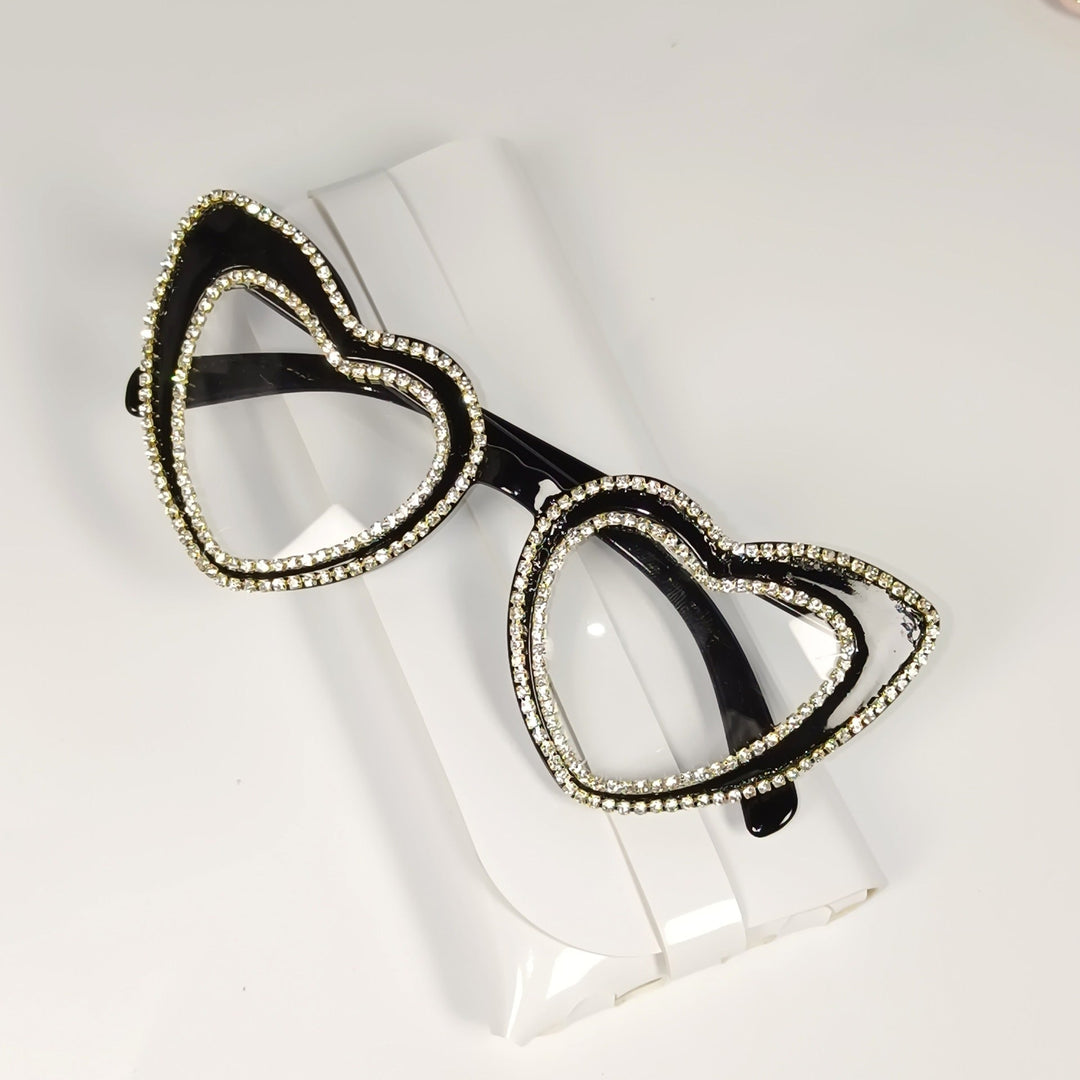 Elegant rhinestone heart sunglasses for women, perfect fashion accessory with UV shield.