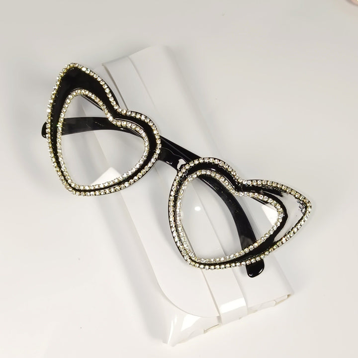 Elegant rhinestone heart sunglasses for women, perfect fashion accessory with UV shield.