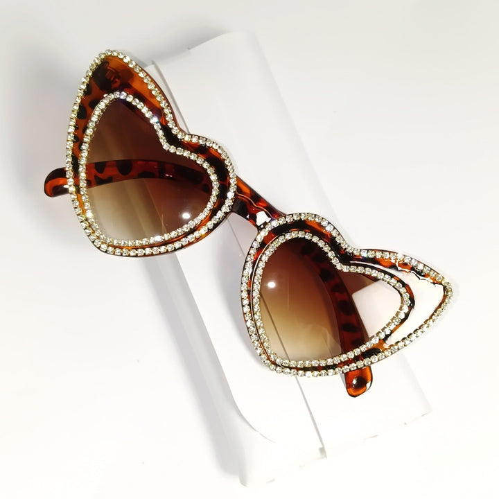 Chic rhinestone heart sunglasses for women, trendy design with gradient lenses and UV.