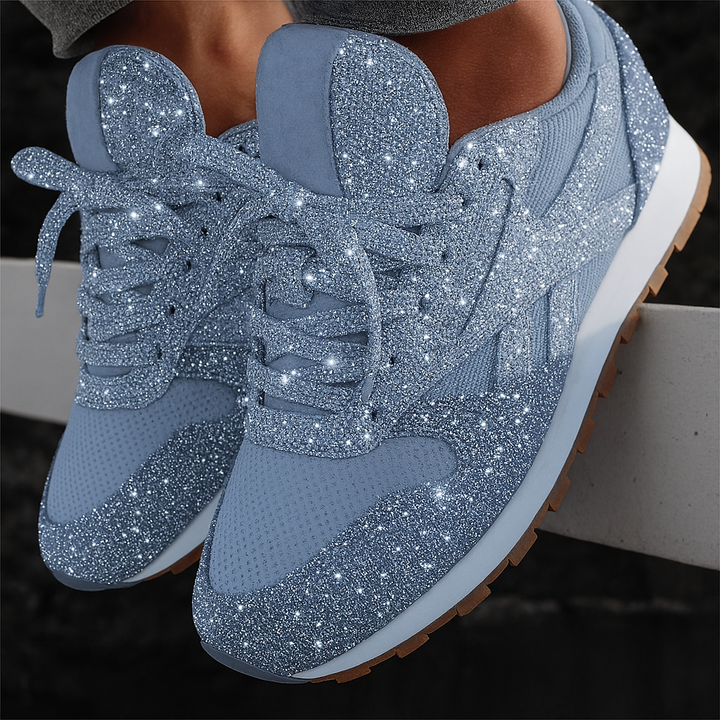 Stylish women's glitter platform sneakers with chunky sole. Comfortable lace-up design for trendy streetwear and casual wear.