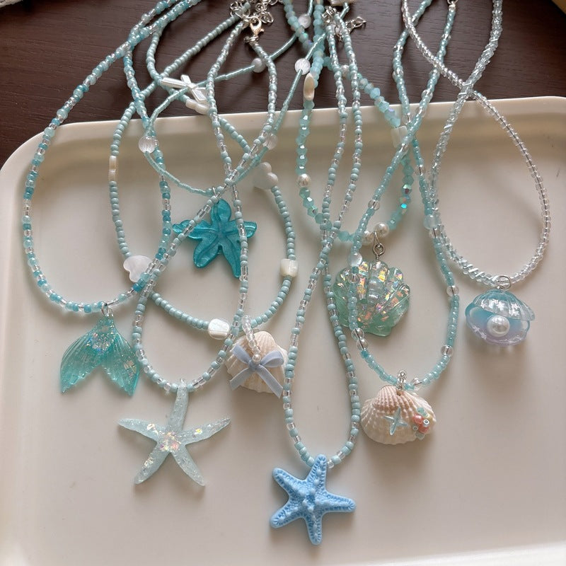 Women's Glitter Fish Tail Necklace, ocean-inspired charm for elegant fashion.
