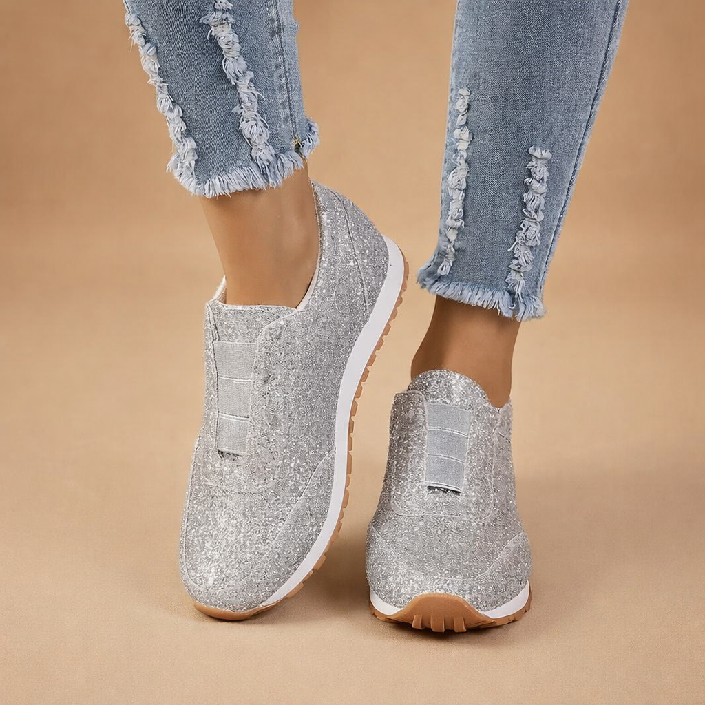 Stylish women's glitter slip-on sneakers, providing ultimate comfort and sparkle for versatile everyday fashion.