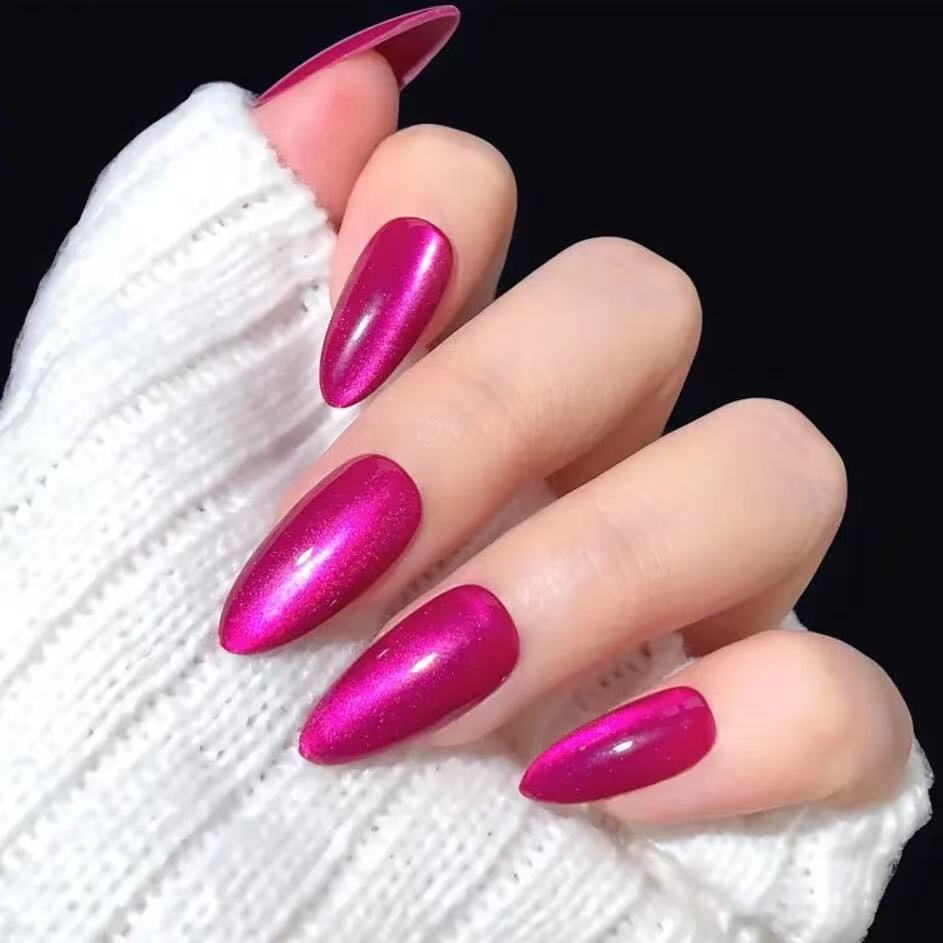 Vibrant dragon fruit false nails, glossy finish. Quick beauty solution for a long-lasting, stylish DIY manicure.