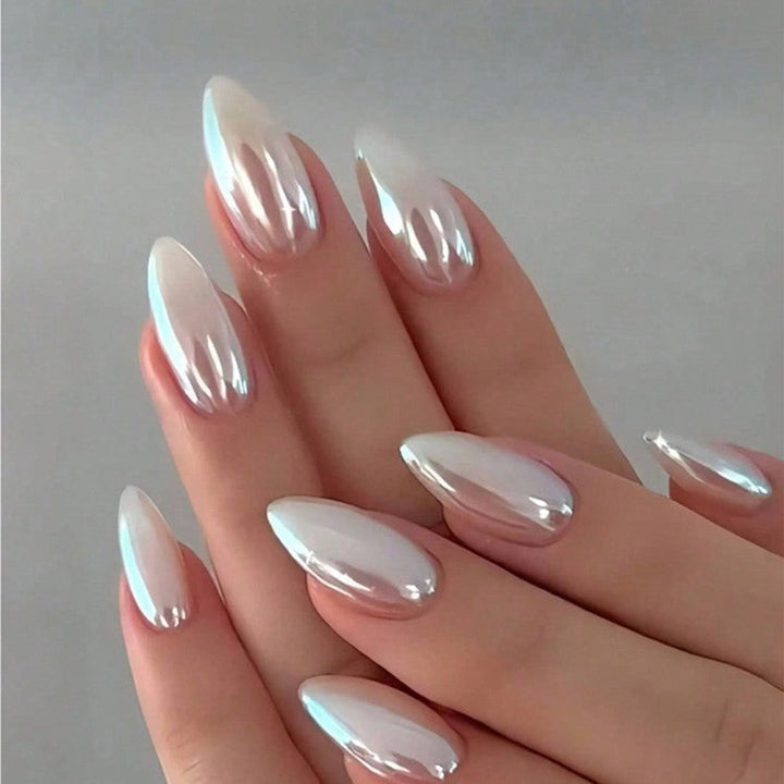 Women's glossy white gel nail extensions for a chic, long-lasting DIY manicure. Durable nail art tips.