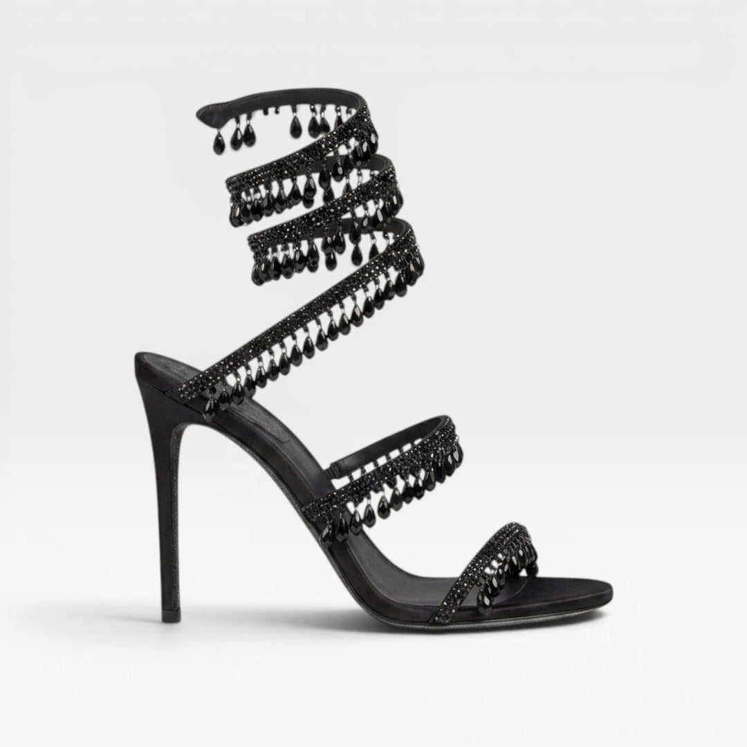 Luxurious gold block heel sandals for women, detailed with sparkling crystals, perfect for special events.