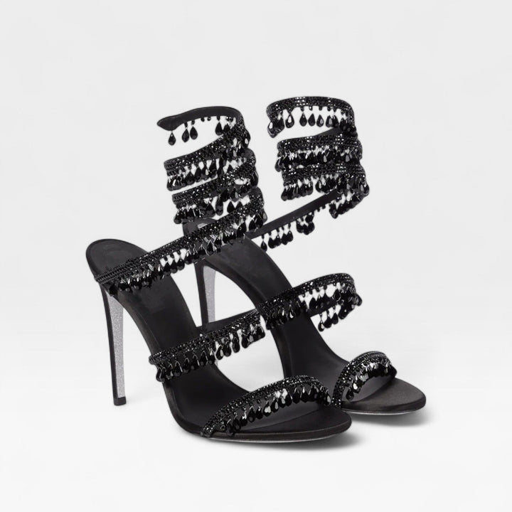 Shimmering gold women's block heels with an ornate crystal design, ideal as formal occasion shoes.