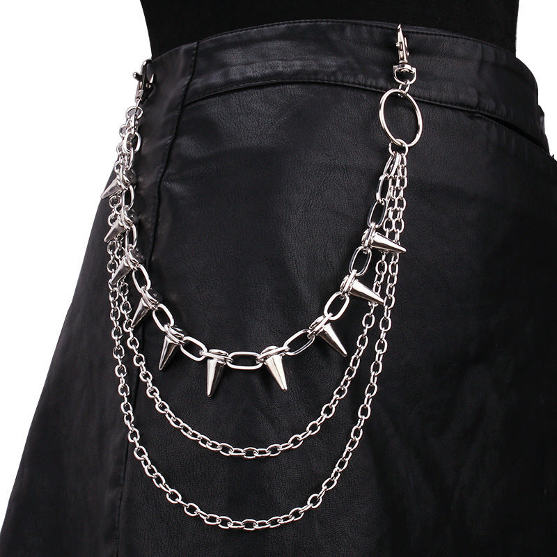 Chic silver chain hip belt for women, featuring edgy stud accents. Perfect for a statement urban look.