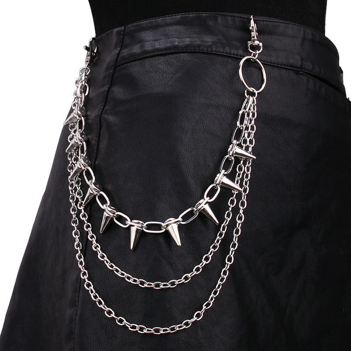 Chic silver chain hip belt for women, featuring edgy stud accents. Perfect for a statement urban look.