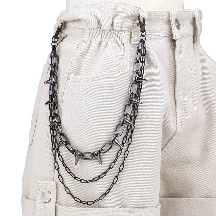 Black fashion chain belt with gold stud accents. An adjustable women's accessory for a trendy statement.