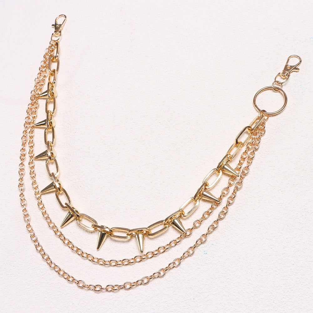 Trendy women's chain belt with stud accents, ideal for hip or waist styling. A versatile fashion accessory.