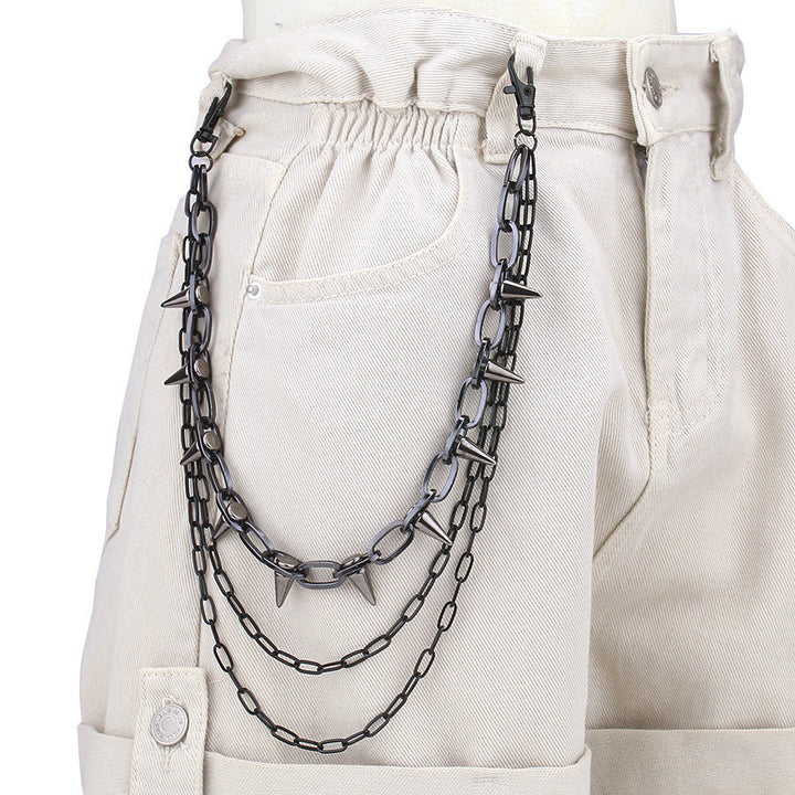 Women's black stud chain belt, a versatile fashion accessory to elevate dresses, jeans, or skirts.