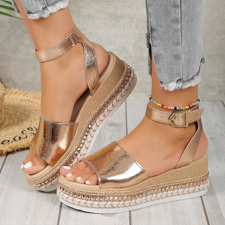 Women's gold metallic orthopedic espadrille sandals with adjustable ankle strap for comfortable foot support.