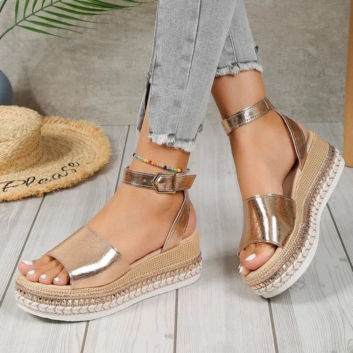 Elegant women's metallic gold espadrille sandals with orthopedic support & adjustable straps, perfect summer footwear.