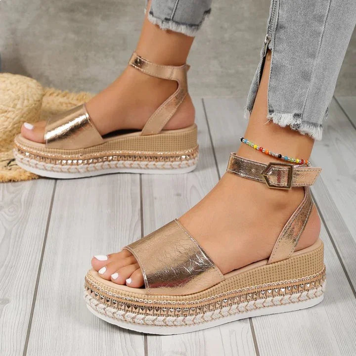 Women's comfortable metallic gold espadrille sandals, orthopedic design with adjustable ankle straps for optimal support.