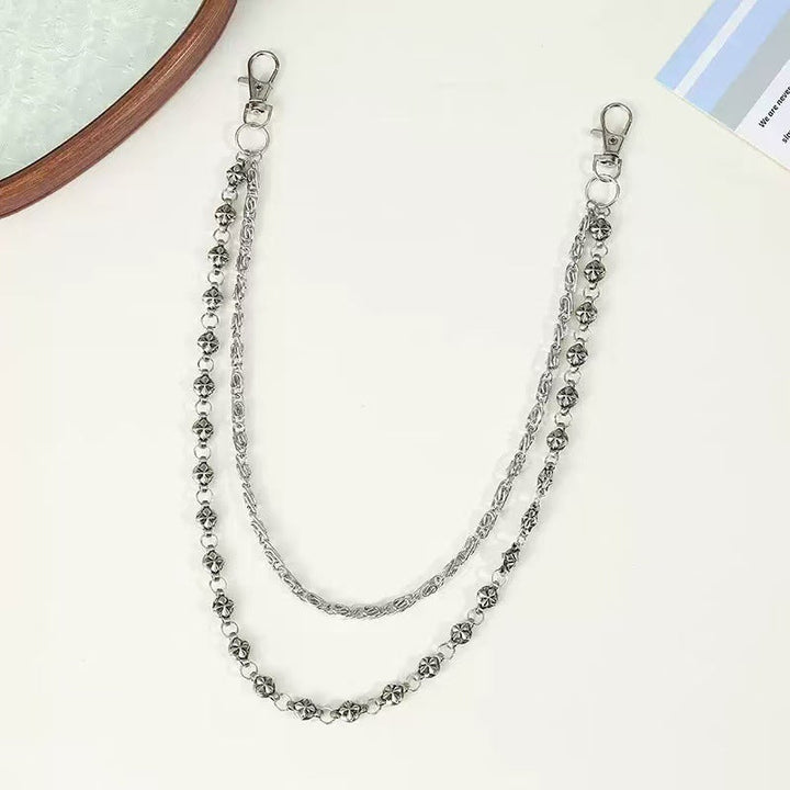 Adjustable gold chain belt for women, featuring stylish decorative pendants. Versatile fashion waist accessory.