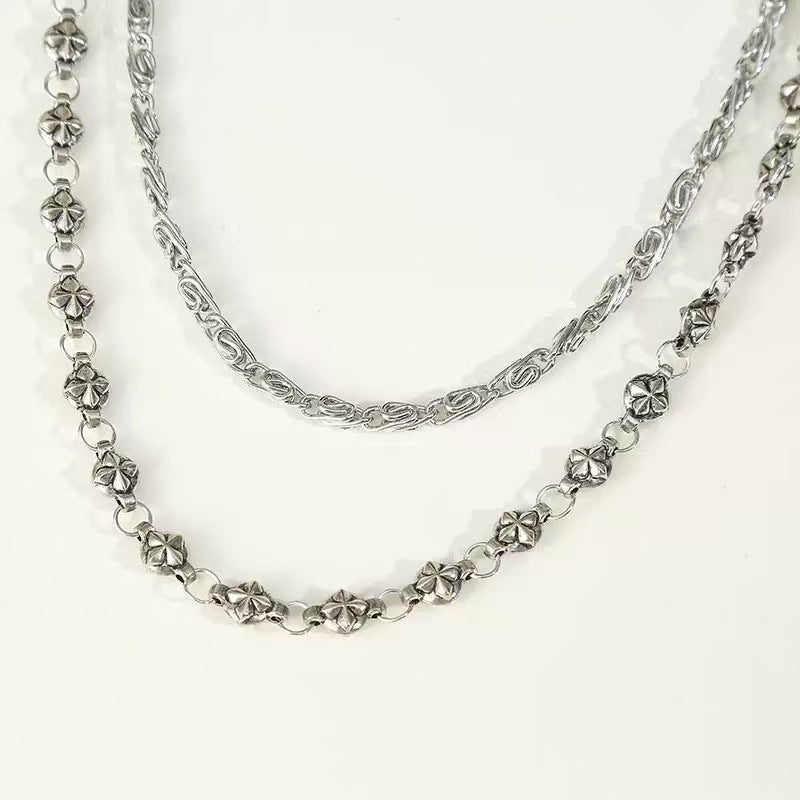 Elegant women's chain belt with intricate decorative pendants. Perfect fashion accessory for dresses or skirts.
