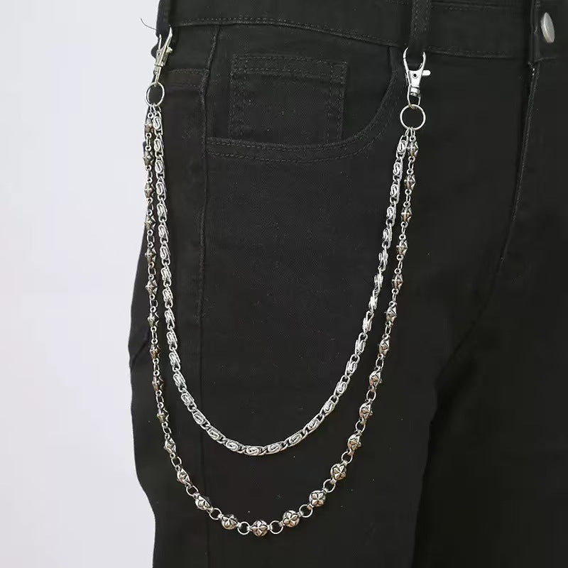 Versatile gold chain belt for women, a stylish fashion accessory with eye-catching decorative pendants.