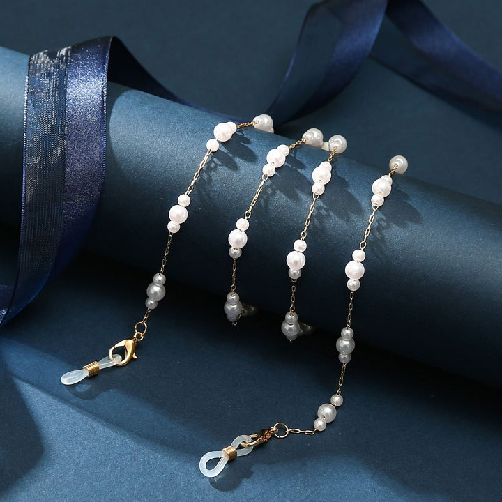 Adjustable gold-plated layered anklet with a central heart charm, perfect for women's style.