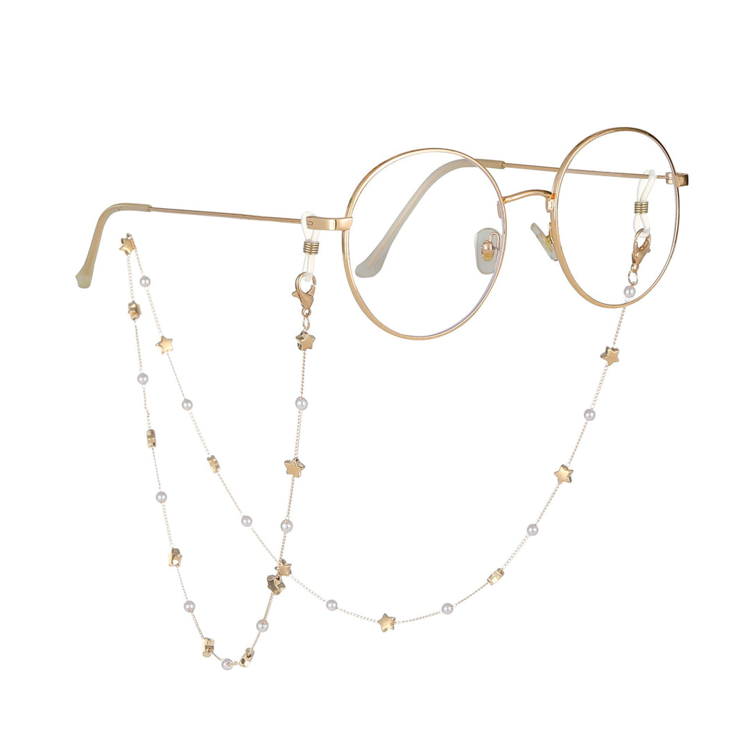Dainty heart charm layered anklet for women, gold-tone chain and elegant pearl accents.