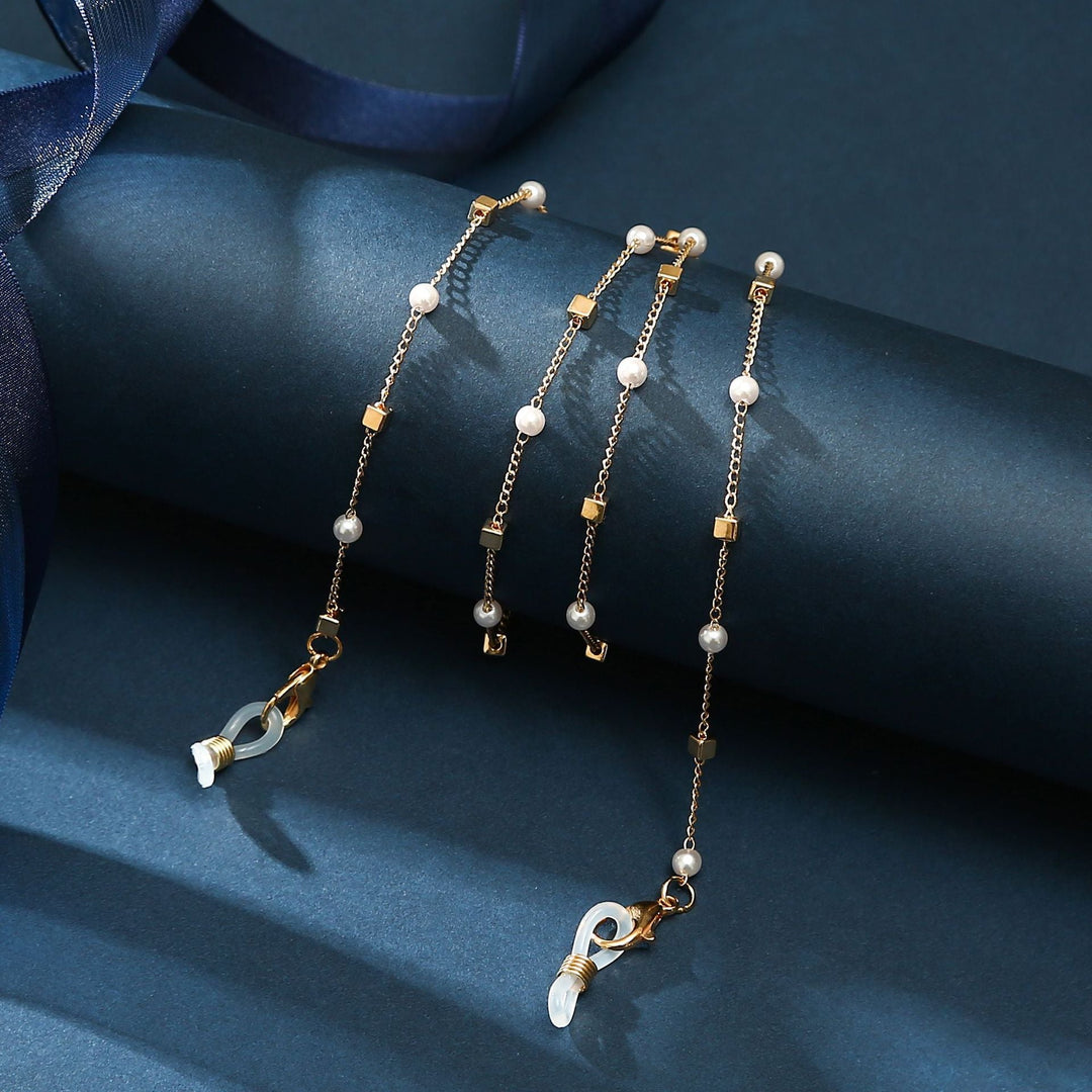 Bohemian style layered anklet with a heart charm, adjustable fit, suitable for women's fashion.