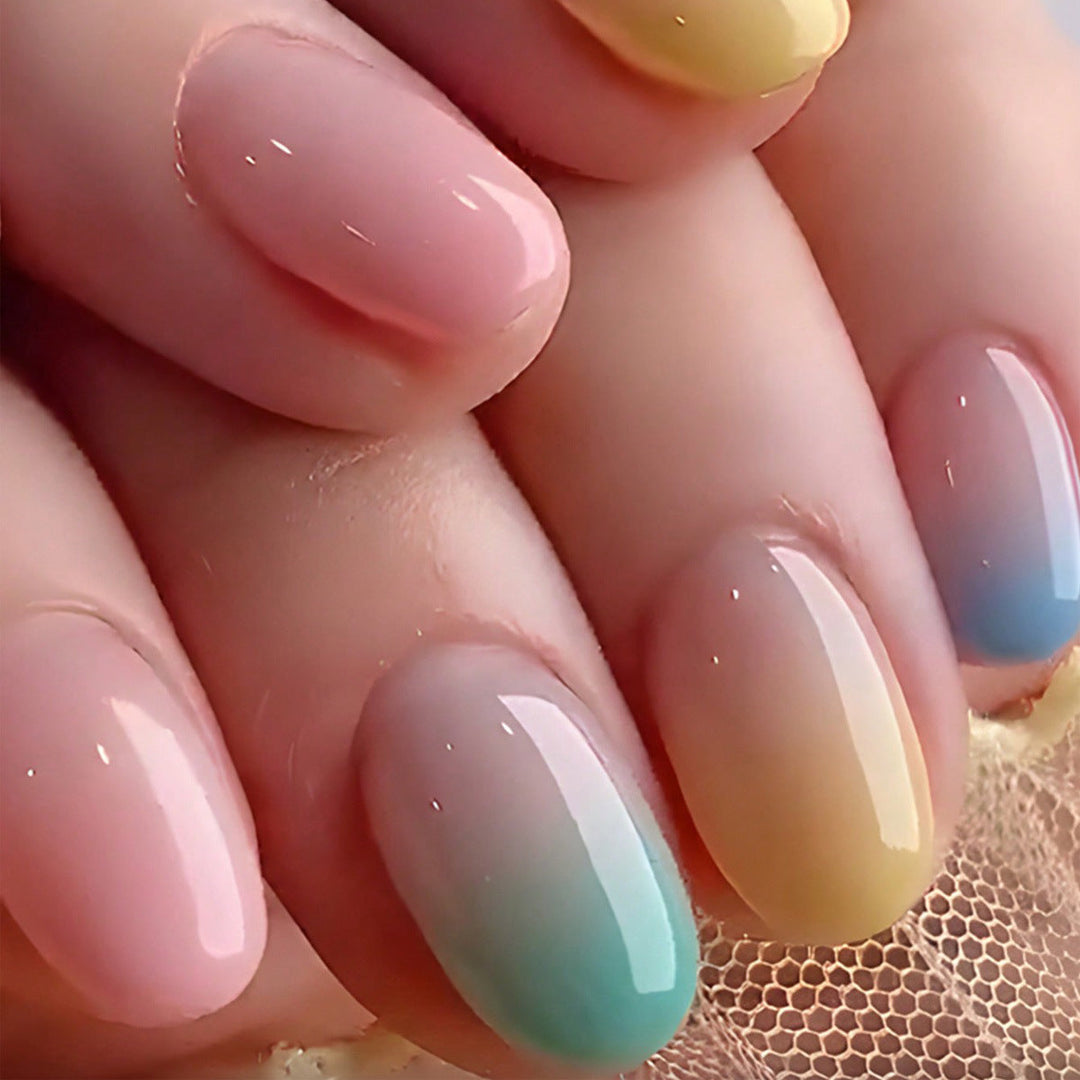 Women's gradient ombre press-on nails set, featuring stylish macaron colors for an easy, durable manicure.