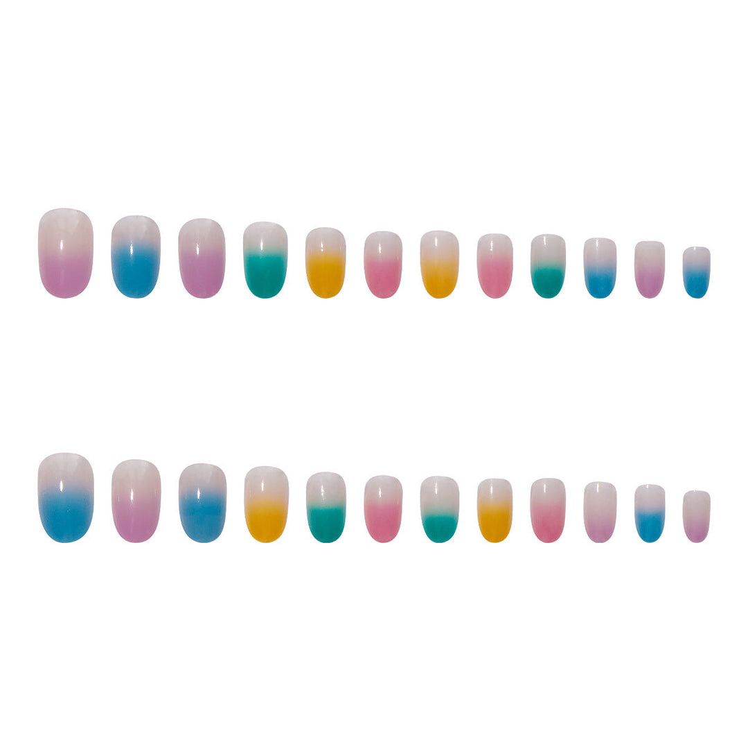 Vibrant gradient ombre press-on nails for women. Durable artificial nails offer a fashionable, easy-to-apply manicure.