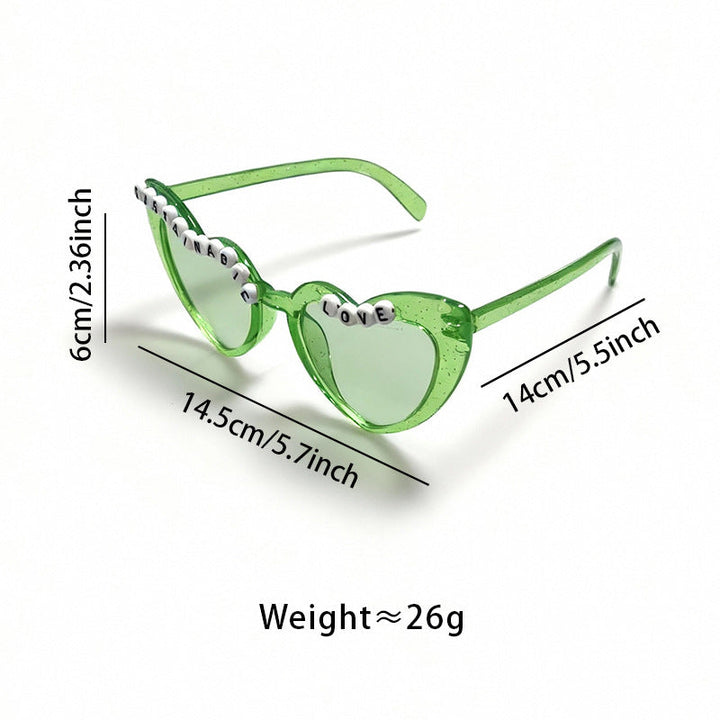 Stylish women's retro cat-eye sunglasses, featuring unique beaded temples. Fashionable UV protection accessory.