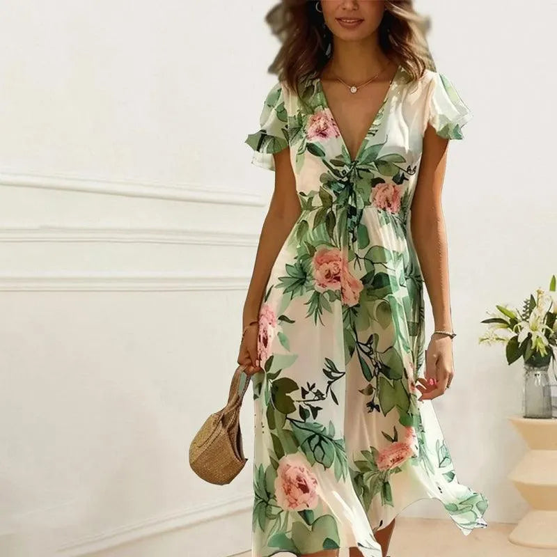 Elegant green floral midi dress for women, featuring a flowy A-line skirt, V-neck, and bohemian flutter sleeves. Ideal for spring.
