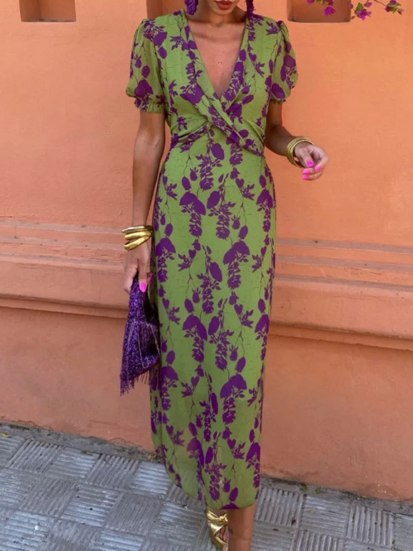 Women's green floral short sleeve V-neck midi dress, a chic choice for elegant summer parties.