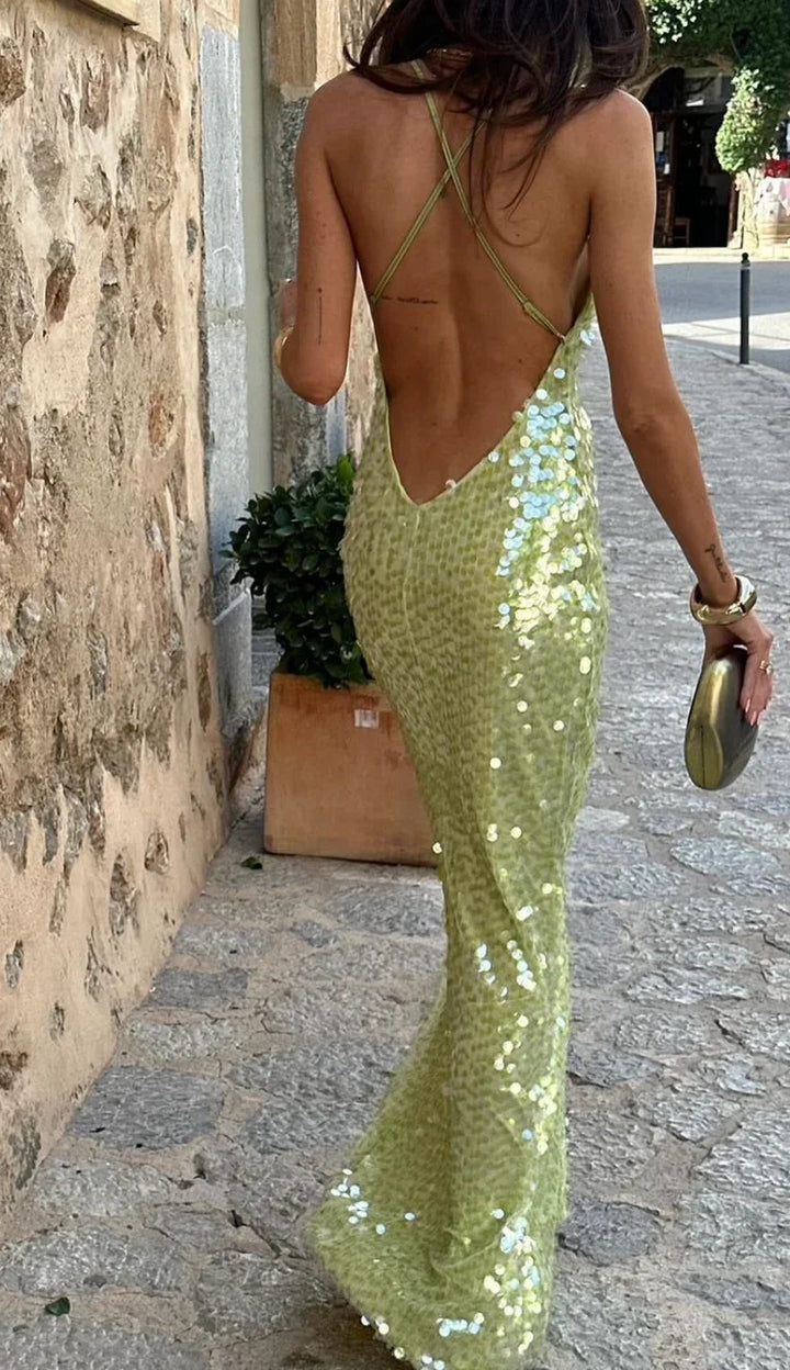 Stunning backless green sequin maxi dress for women, an elegant statement piece for formal parties.