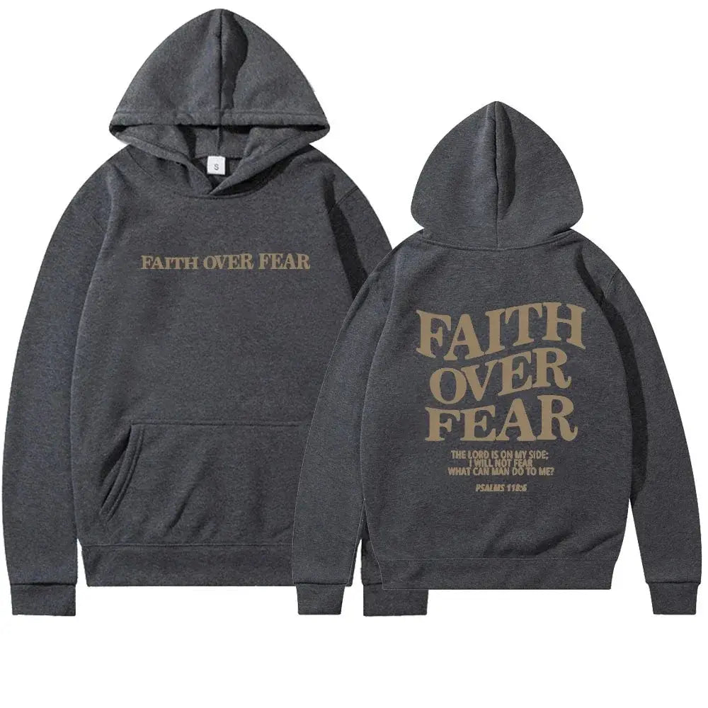Soft pink women's "Faith Over Fear" graphic hoodie, front view, comfortable apparel.