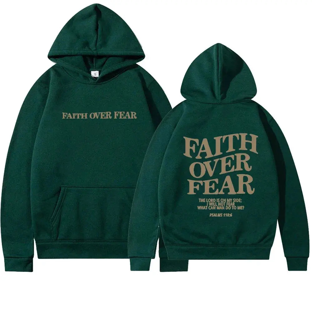 Full-length view: Woman models a "Faith Over Fear" women's comfort hoodie.