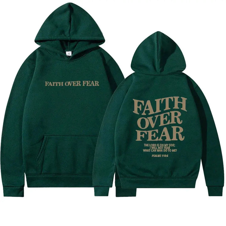 Full-length view: Woman models a "Faith Over Fear" women's comfort hoodie.
