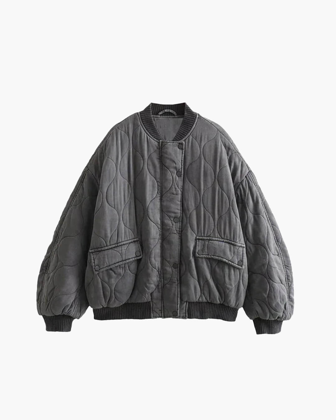Women's grey oversized quilted bomber jacket for effortless casual streetwear. Perfect fall & winter layering.