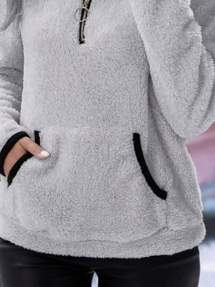 Everyday women's pullover half-zip sweater, warm and cozy with a useful kangaroo pocket.