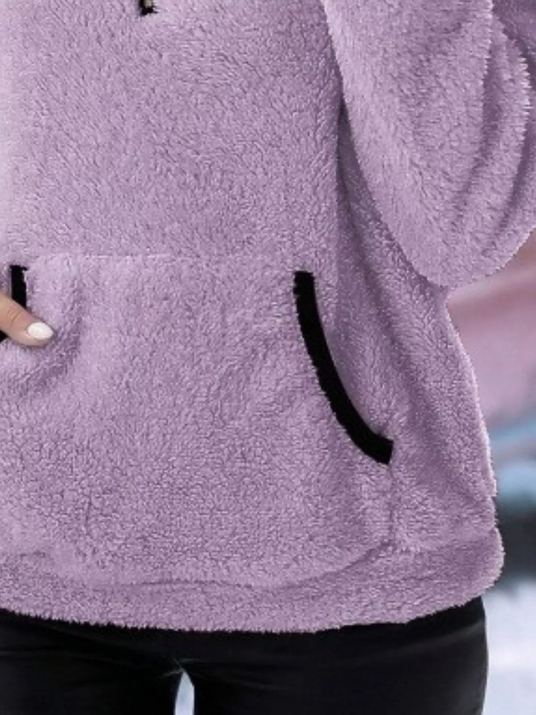 Warm women's half-zip pullover sweater, relaxed fit and comfortable with a front kangaroo pocket.