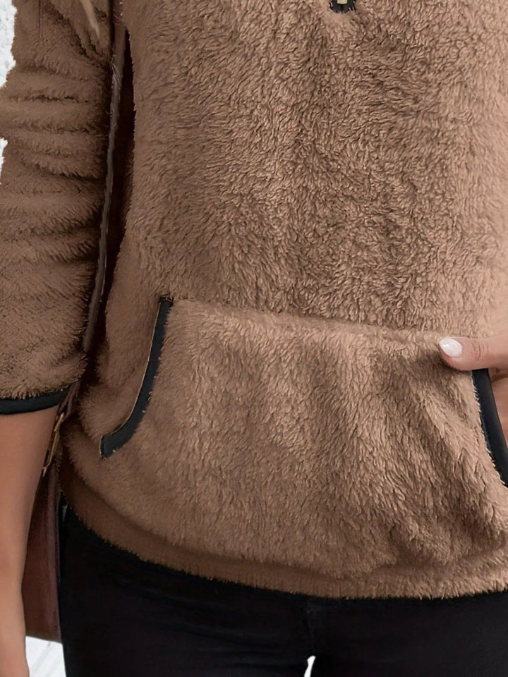 Stylish women's half-zip sweater, long sleeve, comfortable & warm with a practical kangaroo pocket.