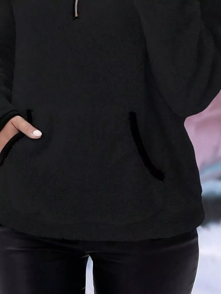 Everyday women's half-zip pullover sweater, warm and relaxed fit with a convenient kangaroo pocket.