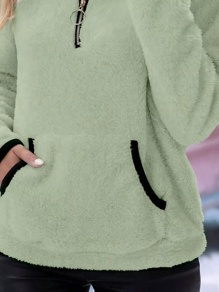 Warm & cozy women's half-zip sweater, pullover with kangaroo pocket for everyday comfort.