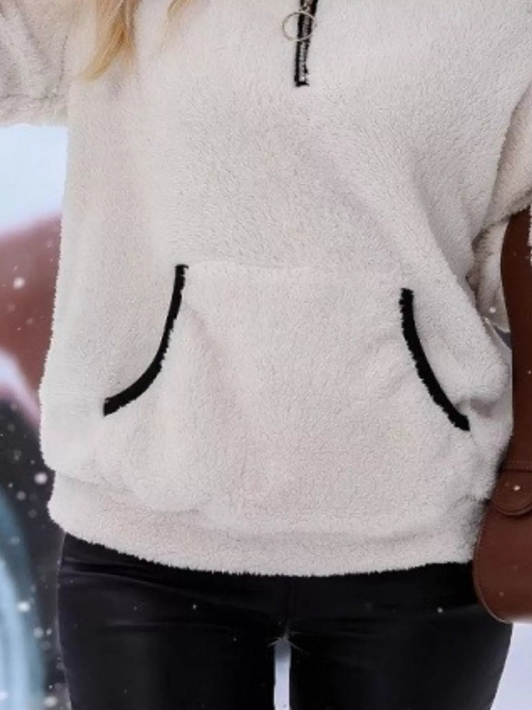 Comfortable women's half-zip sweater, relaxed fit pullover featuring a convenient kangaroo pocket.