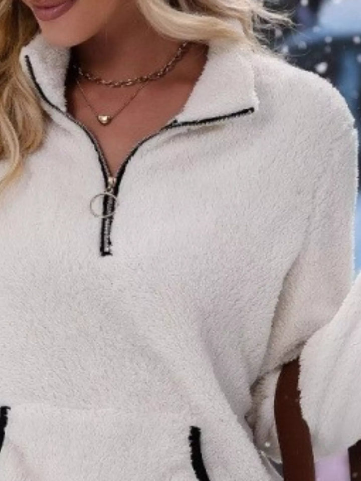 Everyday women's half-zip pullover sweater, cozy long sleeve with a stylish kangaroo pocket.