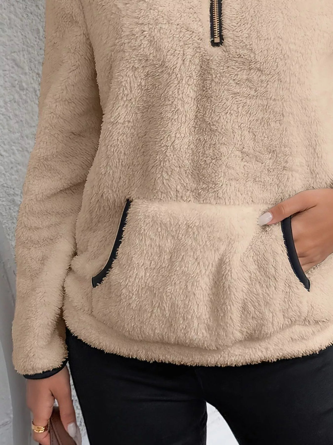 Women's half-zip pullover, cozy and casual sweater with a kangaroo pocket for ultimate comfort.