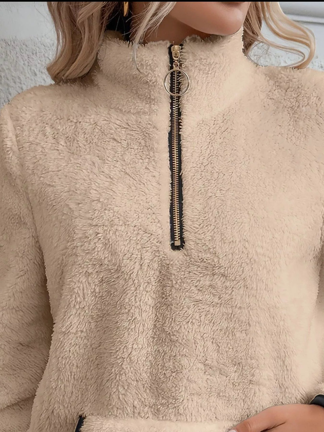 Stylish long sleeve women's half-zip sweater, comfortable relaxed fit with a handy kangaroo pocket.