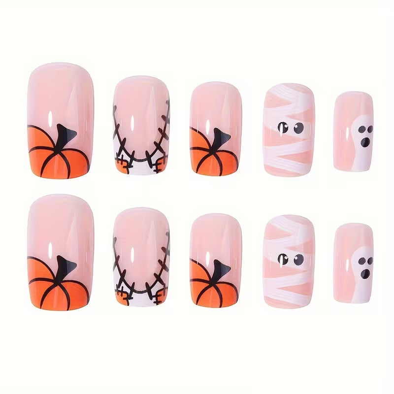 Close-up of Halloween press-on nails showing detailed spooky designs, perfect for a quick & festive makeover.