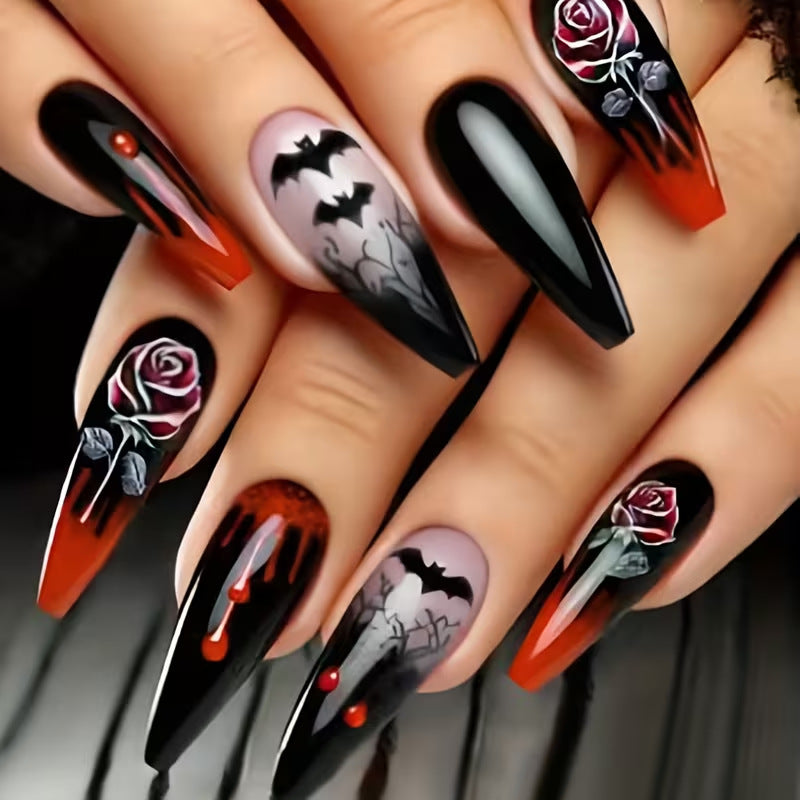 Women's Halloween press-on nails with spooky art designs for festive costume accessories.