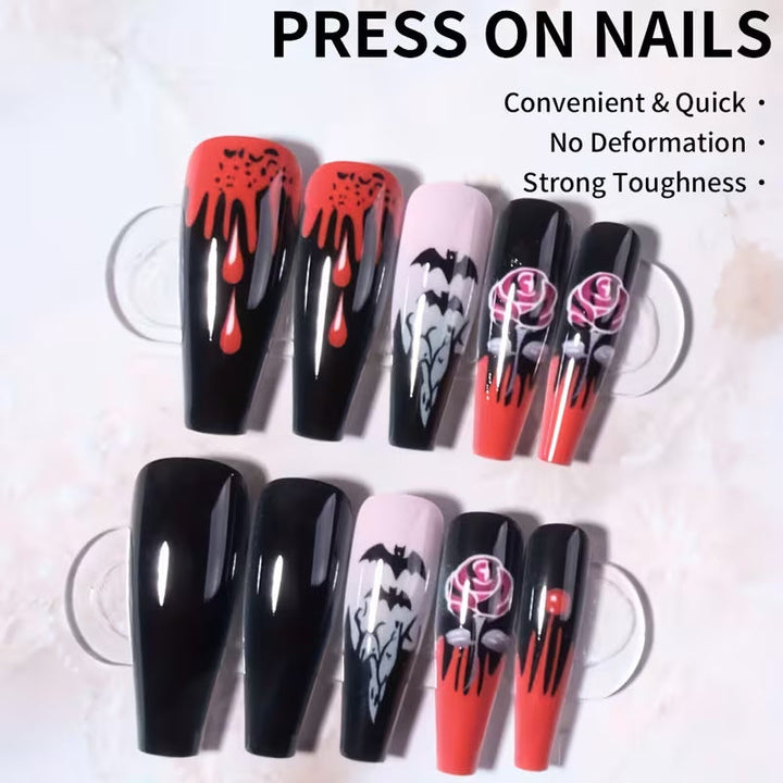 Spooky Halloween art press-on nails featuring ghosts, pumpkins & bats for festive women's costumes.
