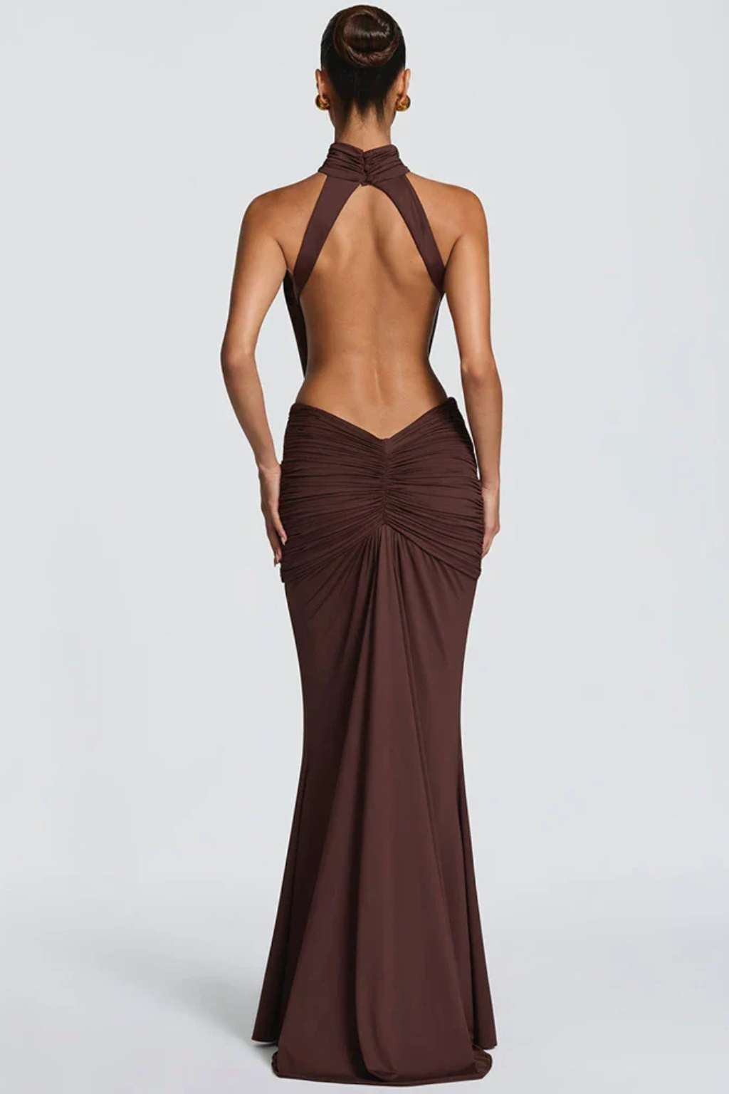 Sophisticated backless ruched bodycon maxi dress with halter neck for women, perfect for special occasions.