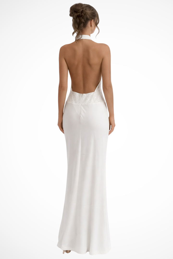 Chic women's halter neck maxi dress with elegant draping and open back detail. Perfect for parties.