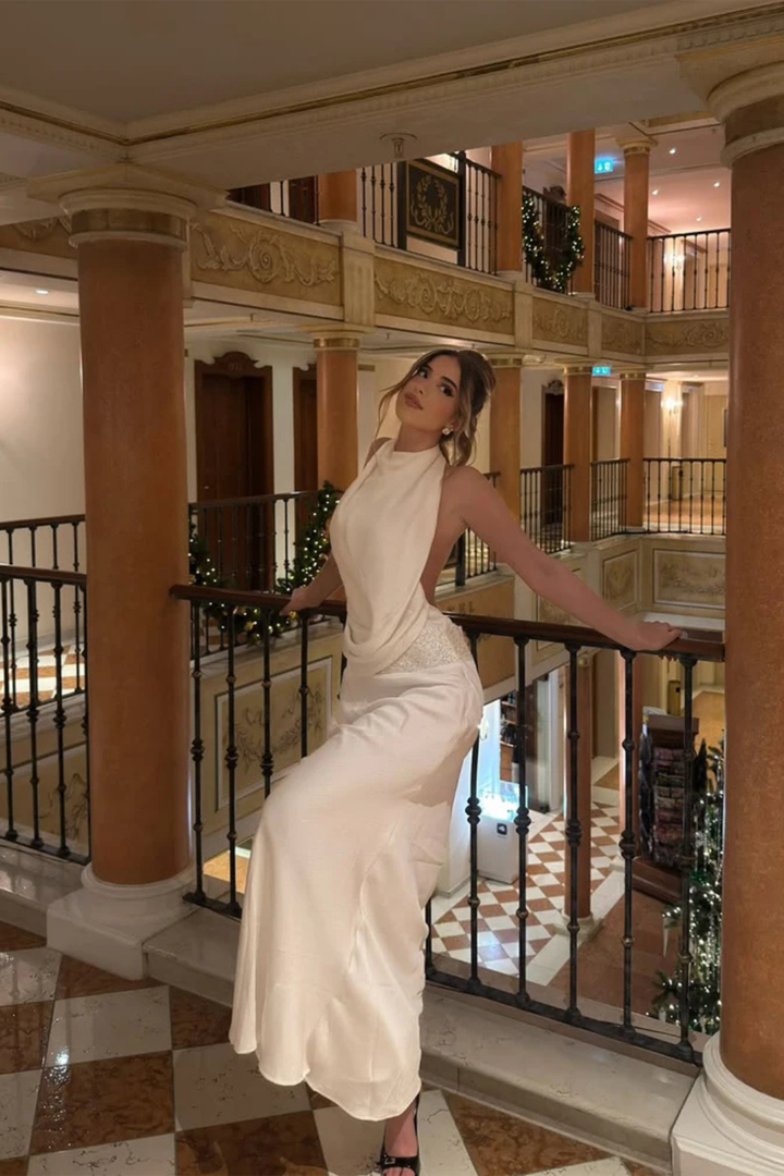 Stylish women's draped maxi dress. Halter neck design, suitable for wedding guests, parties, evening.